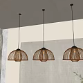 Three Modern Bamboo Woven Dome Shaped Pendant Lights In Interior Space 3d model