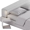 Modern Minimalist Bed Design With Gray White Bedding And Black Nightstand