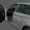 White BMW Hatchback Car With Sleek Exterior And Black Alloy Wheels