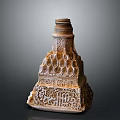 Traditional Architectural Tower With Intricate Carvings Geometric Patterns And Arabic Calligraphy
