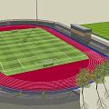 Football Stadium Surrounded by Red Running Track With Grandstand Floodlights Green Grass And Trees