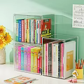 Colorful Books And Magazines On Clear Acrylic Double Layer Bookshelf With Sunflower Vase