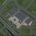 Modern Industrial Factory Complex With Multiple Buildings Green Landscaping And Road Access