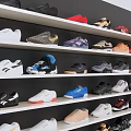 Practical Shoe Cabinet With Multiple Shelves Holding Various Sneakers And Shoes