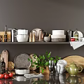 Elegant Assorted Kitchenware Displayed On Shelf And Countertop With Pots Kettles Plates Cutting Boards