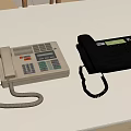 White And Black Landline Telephones With Keypad On White Office Desk