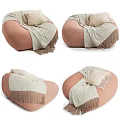 Cozy Pink Bean Bag Chair With Soft Beige Fringed Blanket And Cushion