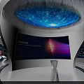 Modern Technology Exhibition Space With Circular Platform Blue Lighting And Digital Screens
