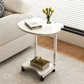 White Side Table With Wheels Books Vase And Decorative Items In Living Room