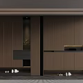 Modern Entryway Storage Design With Dark Brown Cabinets Shoe Storage Lighting And Decorative Plant