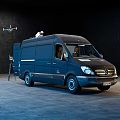 Black Mercedes-Benz Utility Van With Open Door Roof Equipment Drone And Nearby Person