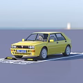 Yellow Lancia Car Parked in Designated Parking Space with Clear Brand Markings