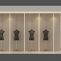 Modern Clothing Store Interior With Dresses Display And Plant Decor