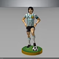 Football Player Model In Argentina Jersey Standing On Green Yellow Base With Soccer Ball