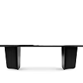 Modern Black Dining Table With Unique Leg Design And Sleek Smooth Surface