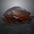 Two Copper Fish Sculptures With Intricate Scales And Shiny Decorative Finish