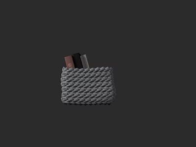 Books And Magazines Stored In Gray Woven Basket For Home Organization 3d model