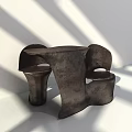 Modern Sculptural Table And Chair Set With Curved Shape And Dark Finish For Interior Decor