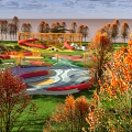 Scenic Park Landscape With Lush Green Lawns Colorful Trees Orange Pavilion And Winding Paths