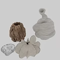 Elegant Handcrafted Decorative Sculptures With Textured Materials And Organic Shapes