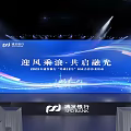 SPD Bank Themed Stage with Illuminated Blue Lighting Branded Display Stands and Digital Screens