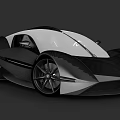 Futuristic Sports Car With Sleek Black And White Body And Large Alloy Wheels