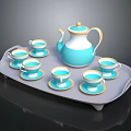 Elegant Blue And White Tea Set With Teapot Teacups Saucers Gold Accents On Gray Tray