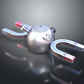 Metal Sphere With Horseshoe Magnets And Red Poles On Reflective Surface