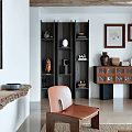 Modern Living Room Interior With White Sofa Wooden Coffee Table Decorative Paintings And Wooden Beams