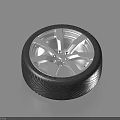 Modern Car Tire with Silver Alloy Spoke Wheel and Deep Tread Pattern 3d model