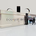 Mobile Digital Products Showcase In Modern Gift Box Shaped Booth With Black Ribbon Bow