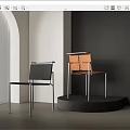 Modern Black and Orange Dining Chairs with Metal Frame in Contemporary Interior Design