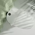 Sleek White Toilet With Modern Design Against Green Wall And Palm Leaf Shadow