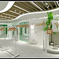 Modern Green Clothing Store Interior With Mannequins Racks And Green Plants