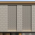 Modern Stone Storefront Facade With Lattice Panels And Brand Signage Lighting