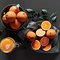 Whole And Sliced Oranges In Bowl With Fresh Orange Juice Green Leaves And Gray Cloth