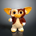Cute Gremlin Character Toy With Large Ears Big Eyes Brown White Fur And Waving Hand