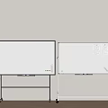 Two Whiteboards With Mobile Stands One Blank And Papers On Wooden Floor And Light Wall