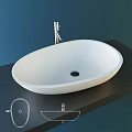 Modern White Oval Shaped Countertop Washbasin With Chrome Faucet On Dark Surface