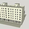 Multi Story Apartment Building Exterior With Balconies And Trees Under Blue Sky