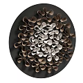 Circular Metal Wall Hanging With Brown Silver Curved Pieces And Spiral Pattern On Black Background