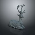 Gray Reclining Deer Sculpture With Ornate Antlers And Decorative Patterns