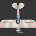 Vintage Biplane Model With Red Wings Gray Fuselage Blue Cockpit And Colorful Tail Propeller