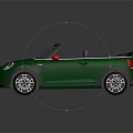 Green Compact Convertible Car With Black Roof Red Side Mirrors And Round Headlights