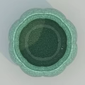 Green Ceramic Cup With Petal Shaped Edge And Textured Surface Design 3d model