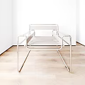 Minimalist Modern Single Chair With Stainless Steel Frame And Sleek Armrests In Bright Room