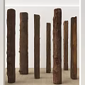 Dark Arbor Tree Trunks in Indoor Gallery with Light Wooden Floor and Varying Heights