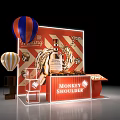 Monkey Shoulder Photo Spot With Red White Striped Background Golden Decorations And Hot Air Balloons