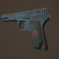Black Pistol With Red Star Emblem On Grip And Metallic Body Finish