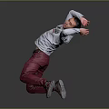 Man Kneeling Arms Raised Behind Head In Grey Green Print Top Red Pants Grey Background